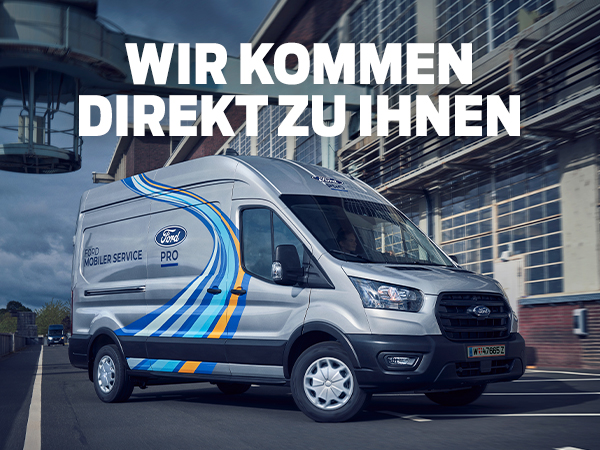 Ein Ford Transporter fährt auf einer Straße, mit dem Slogan 